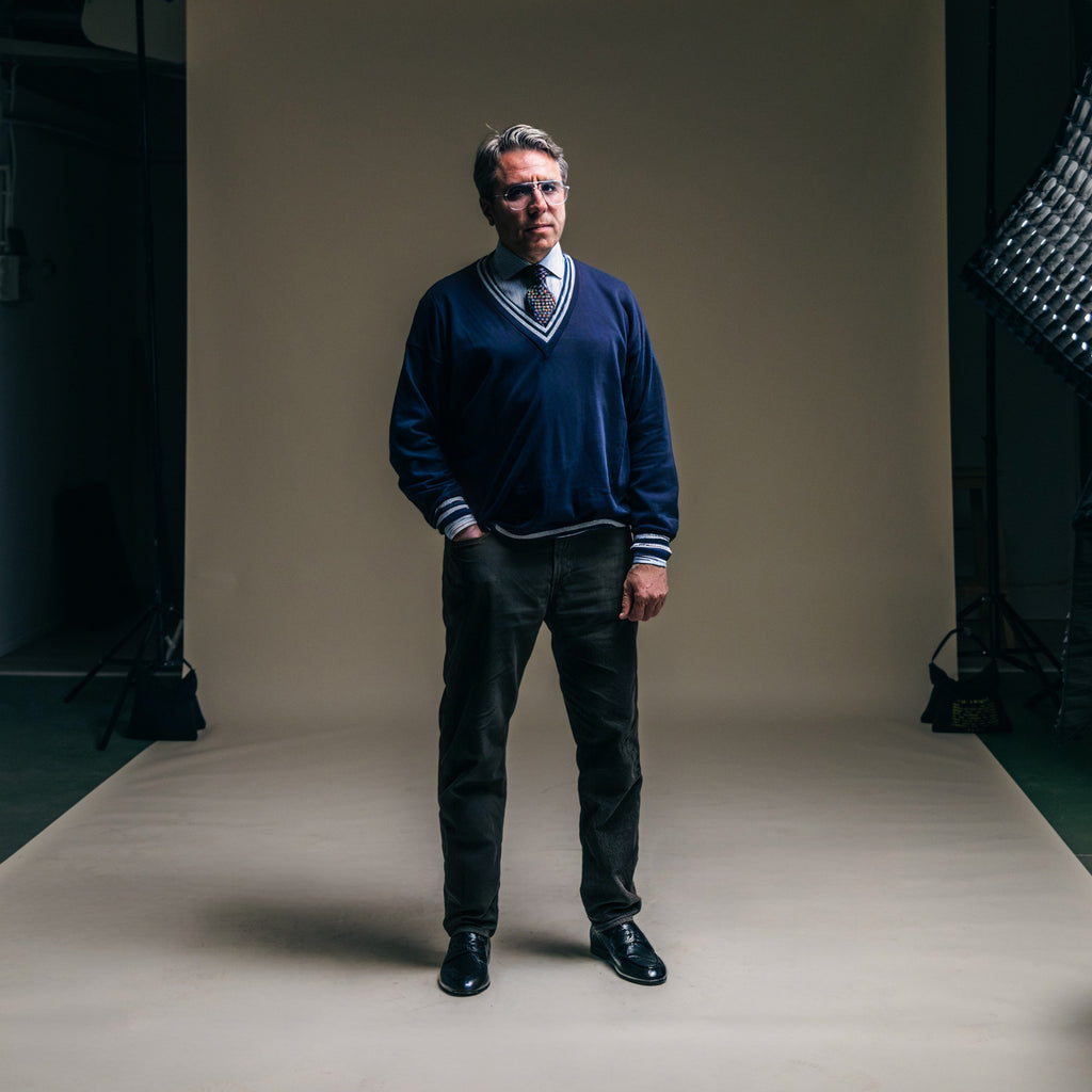 Vintage Club V-Neck Sweater in Navy — styled studio view