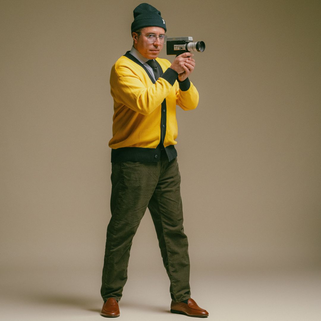 Vintage Fit Cardigan in Collegiate Yellow and Navy — close-up lifestyle view