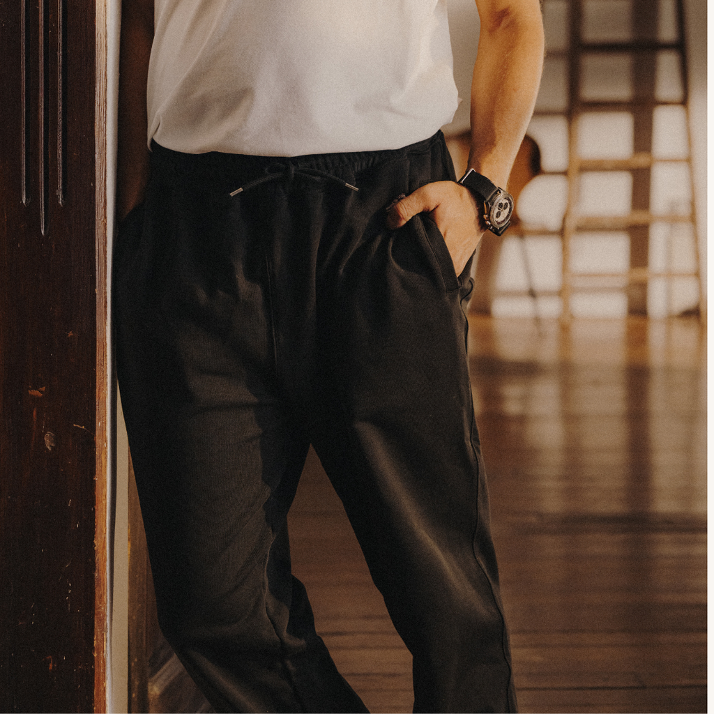 Retro Gym Sweatpants in Black — styled close-up