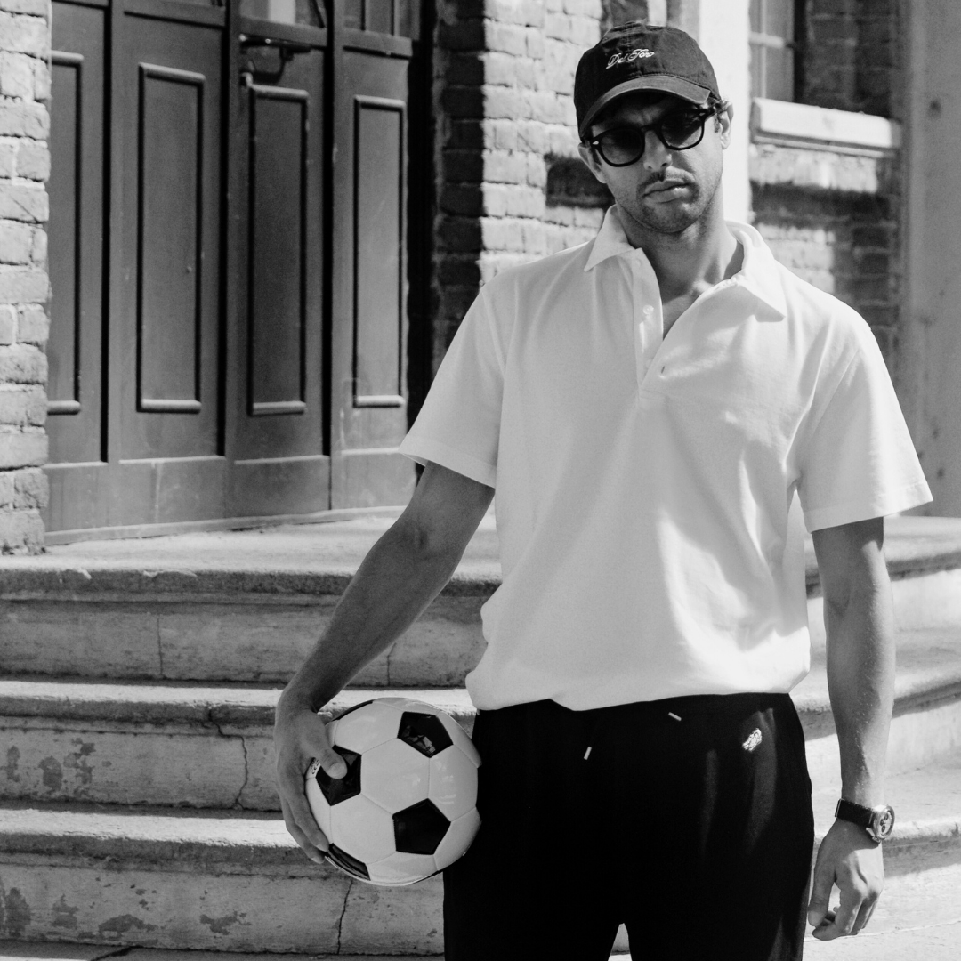 Short Sleeve Polo in Panna White — black and white styled view