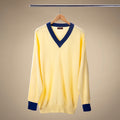 Vintage V-Neck Sweater in Vintage Yellow — hanger product view