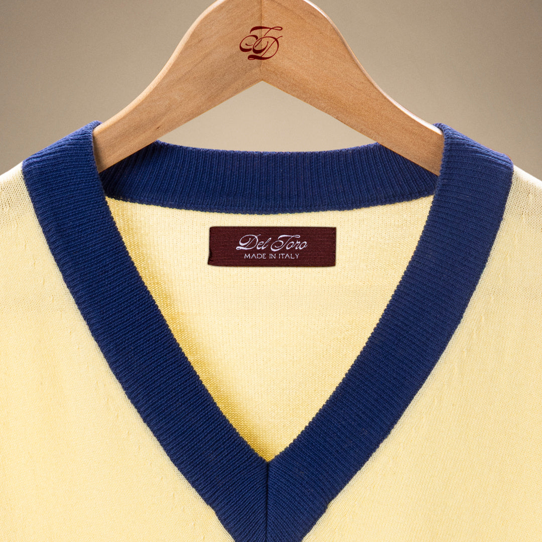Vintage V-Neck Sweater in Vintage Yellow — hanger close-up